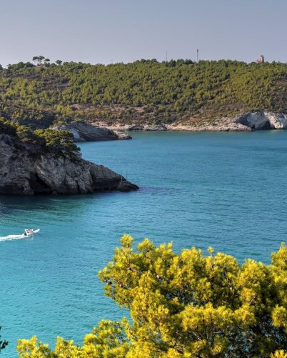 Breathtaking coastal arch and turquoise waters in Puglia, Italy's nature.